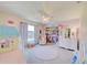Charming bedroom with closet and playful decor at 13267 Linzia Ln, Spring Hill, FL 34609