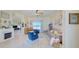 Relaxing living room with comfortable seating and a fireplace at 13267 Linzia Ln, Spring Hill, FL 34609