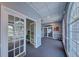 Community hall interior with doors and carpeted floor at 13267 Linzia Ln, Spring Hill, FL 34609