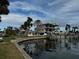 Newly constructed home on the waterfront with a boat dock at 11480 4Th E St, Treasure Island, FL 33706