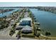 Aerial view of waterfront community and canal at 11480 4Th E St, Treasure Island, FL 33706
