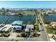 Aerial view of waterfront property and neighborhood at 11480 4Th E St, Treasure Island, FL 33706