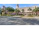 Luxury building with grand entrance and lush landscaping at 1120 North Shore Ne Dr # 201, St Petersburg, FL 33701