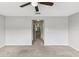 Bedroom with carpeting and access to hallway at 2622 Lantern Hill Ave, Brandon, FL 33511