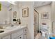 Clean bathroom with shower, toilet, and vanity at 12400 Dearborn Dr # F, Hudson, FL 34667