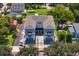 Two-unit building with garages and a paved walkway at 208 W Frances Ave # 1, Tampa, FL 33602