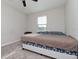 Spacious bedroom with large bed and window coverings at 10038 Corso Milano Dr, Tampa, FL 33625