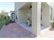 Covered patio with seating area and access to backyard at 10038 Corso Milano Dr, Tampa, FL 33625