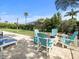 Enjoy evenings by the fire pit with seating on a brick patio at 14173 Pullman Dr, Spring Hill, FL 34609