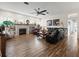 Inviting living room featuring a fireplace, built-in shelving, and comfortable seating at 14173 Pullman Dr, Spring Hill, FL 34609