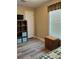 Well lit room with wood-look flooring and ample storage space at 36822 Kay Ave, Zephyrhills, FL 33542
