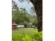 Gazebo provides a comfortable shady spot to relax and enjoy the neighborhood at 36822 Kay Ave, Zephyrhills, FL 33542