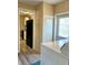 Laundry Room with easy access to Kitchen at 36822 Kay Ave, Zephyrhills, FL 33542
