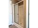 Clean shower with a glass door and built-in seat at 36822 Kay Ave, Zephyrhills, FL 33542