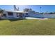 Spacious backyard with pool and grassy lawn at 4310 Huntington Ne St, St Petersburg, FL 33703