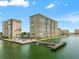 Stunning aerial view of waterfront condos, private docks, and the community's beautiful coastal location at 5200 Brittany S Dr # 1202, St Petersburg, FL 33715
