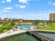 Stunning community pool with ample seating and scenic water views, perfect for relaxation and entertainment at 5200 Brittany S Dr # 1202, St Petersburg, FL 33715