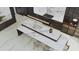 Gourmet kitchen island with marble countertop and wine cooler at 1076 Snell Isle Ne Blvd, St Petersburg, FL 33704