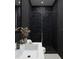 Modern bathroom with black marble shower and floating vanity at 1076 Snell Isle Ne Blvd, St Petersburg, FL 33704