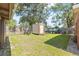 Backyard with storage shed and basketball hoop at 3216 E Fern St, Tampa, FL 33610