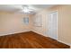 Bedroom with hardwood floors and a large closet at 5200 Brittany S Dr # 1202, St Petersburg, FL 33715