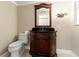 Small bathroom with a pedestal sink and a toilet at 5200 Brittany S Dr # 1202, St Petersburg, FL 33715