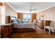 Main bedroom with hardwood floors, large windows, and ample furniture at 5200 Brittany S Dr # 1202, St Petersburg, FL 33715
