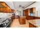 Spacious kitchen with granite countertops and modern appliances at 5200 Brittany S Dr # 1202, St Petersburg, FL 33715