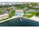 Aerial view of waterfront community with pool and dock at 5200 Brittany S Dr # 1202, St Petersburg, FL 33715