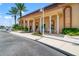 Inviting residents club entrance with columns and landscaping at 5200 Brittany S Dr # 1202, St Petersburg, FL 33715
