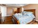 Spacious bedroom with hardwood floors and en-suite bathroom access at 5200 Brittany S Dr # 1202, St Petersburg, FL 33715