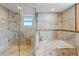 Spa-like bathroom with a large walk-in shower and a soaking tub at 5200 Brittany S Dr # 1202, St Petersburg, FL 33715