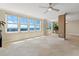 Sunlit living area with hardwood floors and stunning water views at 5200 Brittany S Dr # 1202, St Petersburg, FL 33715