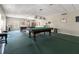 Relaxing game room with two billiard tables at 5200 Brittany S Dr # 1202, St Petersburg, FL 33715