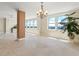 Spacious living room with tile floors, large windows and water views at 5200 Brittany S Dr # 1202, St Petersburg, FL 33715