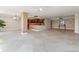Open concept living area with kitchen, tile floors, and a breakfast bar at 5200 Brittany S Dr # 1202, St Petersburg, FL 33715