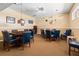 Game room with card tables and comfortable seating at 5200 Brittany S Dr # 1202, St Petersburg, FL 33715