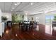 Bright community room with multiple tables and a tropical mural at 5200 Brittany S Dr # 1202, St Petersburg, FL 33715