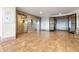 Building lobby with two elevators and tile flooring at 5200 Brittany S Dr # 1202, St Petersburg, FL 33715