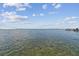 Scenic view of calm water and distant shoreline at 980 Boca Ciega Isle Dr, St Pete Beach, FL 33706