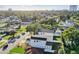 Aerial showing a white house and surrounding homes at 3119 W Cypress St, Tampa, FL 33607