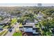 Aerial view of a modern house and surrounding neighborhood at 3119 W Cypress St, Tampa, FL 33607