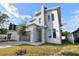 Modern two-story house with green door and gray exterior at 3119 W Cypress St, Tampa, FL 33607