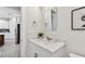Small bathroom with white vanity and marble countertop at 3119 W Cypress St, Tampa, FL 33607