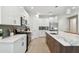Modern kitchen with stainless steel appliances and white cabinetry at 3119 W Cypress St, Tampa, FL 33607