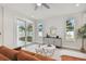 Bright living room with sliding glass doors leading to backyard at 3119 W Cypress St, Tampa, FL 33607
