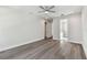 Well-lit bedroom with hardwood floors and ensuite bathroom access at 3119 W Cypress St, Tampa, FL 33607