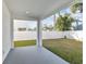 Covered patio overlooking a fenced backyard at 3119 W Cypress St, Tampa, FL 33607