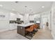 Modern kitchen with white cabinets and large island at 3119 W Cypress St, Tampa, FL 33607
