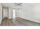 Bright bedroom with hardwood floors and access to a bathroom at 3119 W Cypress St, Tampa, FL 33607